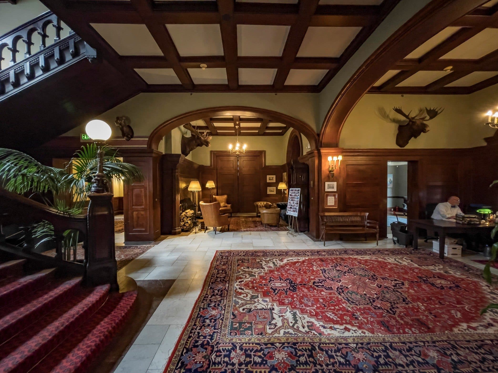 Main hall with stair and historic furnishings