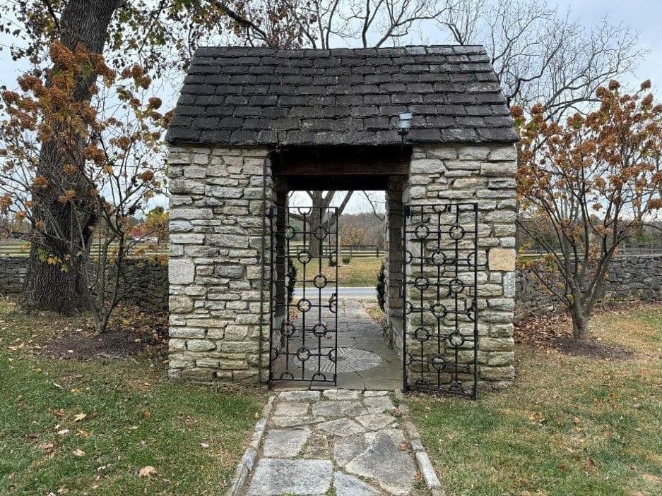Stone lychgate at the cemetery entrance